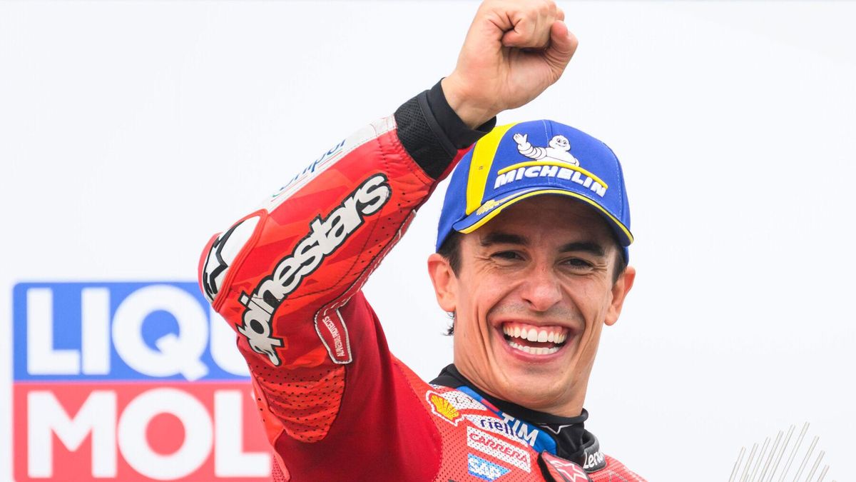 Winner Marc Marquez from Spain from the Ducati Lenovo Team celebrates on the podium following the MotoGP race, German Grand Prix, at the Sachsenring circuit, in Hohenstein-Ernstthal, Germany, Sunday July 13, 2025. (Robert Michael/dpa via AP). GERMANY OUT; MANDATORY CREDIT