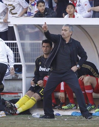 Real Madrid's coach Jose Mourinho gestures during their Spanish First Division soccer match against Rayo Vallecano at Teresa Rivero stadium in Madrid