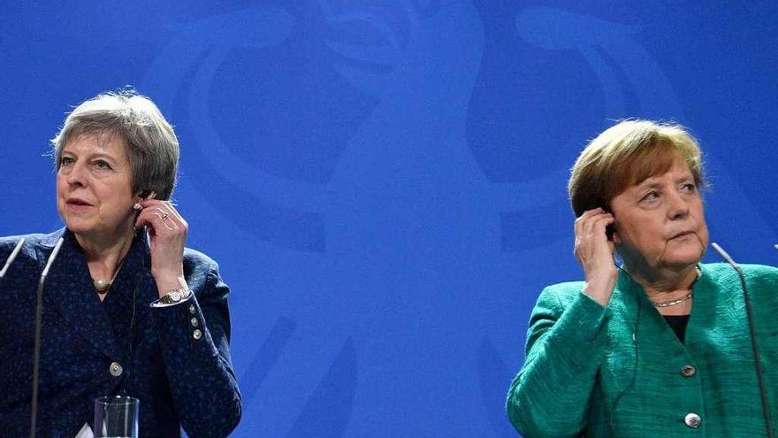 May y Merkel, el viernes, en la Conferencia de Seguridad de Múnich.