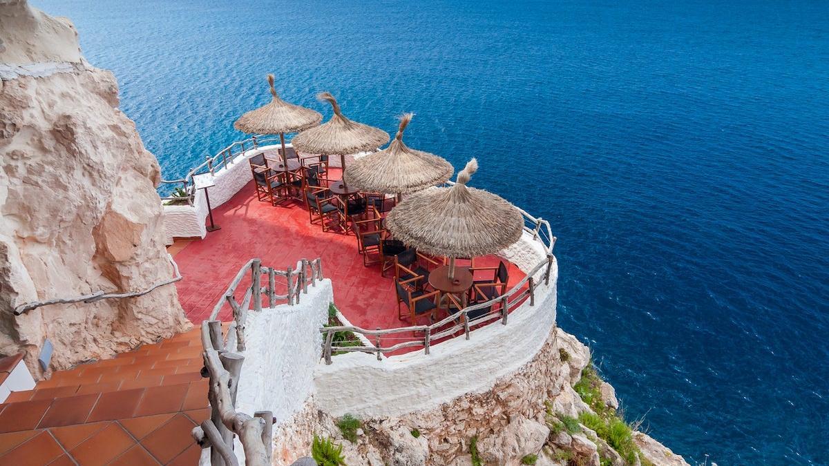 Cliff-top bar in Menorca overlooking the Mediterranean Sea