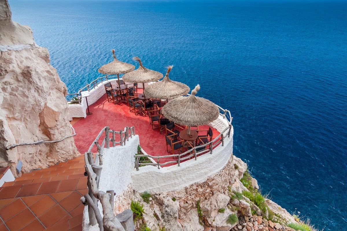 Cliff-top bar in Menorca overlooking the Mediterranean Sea