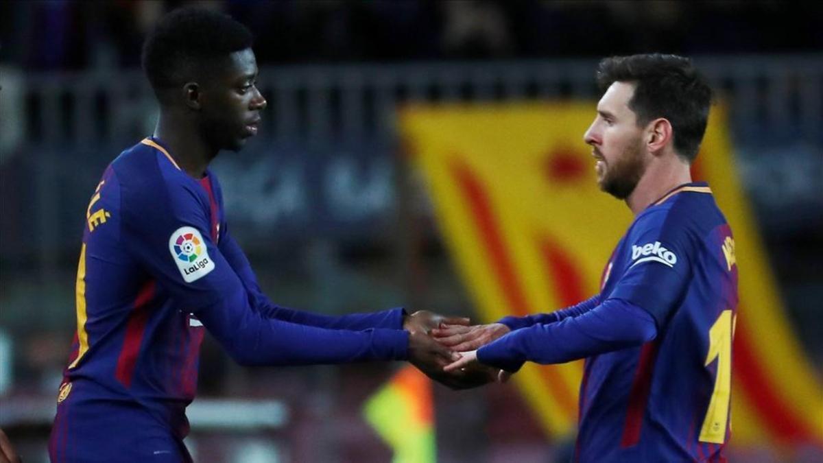Ousmane Dembelé con Leo Messi