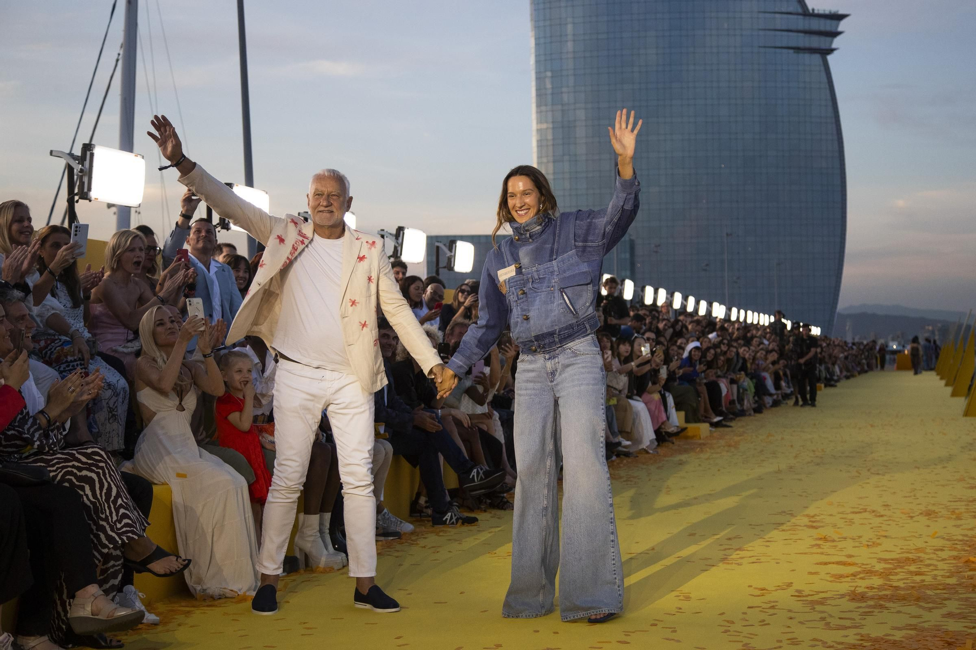 Desigual's owner Thomas Meyer (L) reacts during the brand's fashion show on occasion of the brand's 40th anniversary, in Barcelona, Spain, 06 June 2024. EFE/ Marta Perez