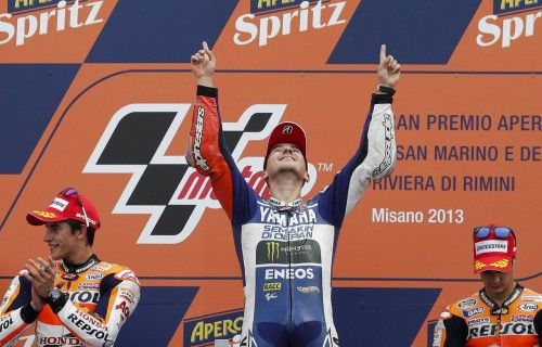 Yamaha MotoGP rider Lorenzo of Spain celebrates on the podium after winning the San Marino Grand Prix in Misano circuit