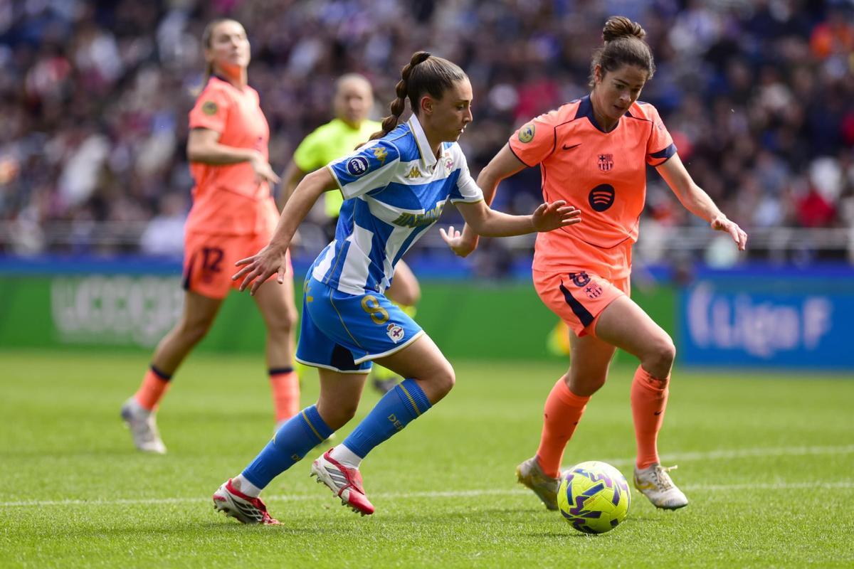 Olaya, en acción, ante Marta Torrejón