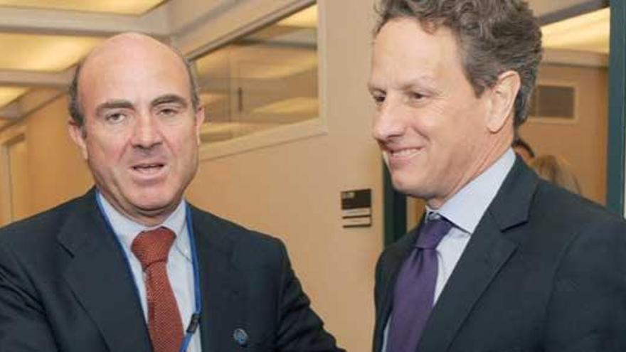 De Guindos, con Geithner.