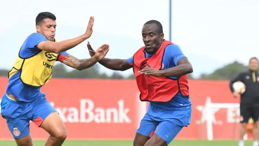 Pedro Porro i Doumbia en un entrenament a La Vinya