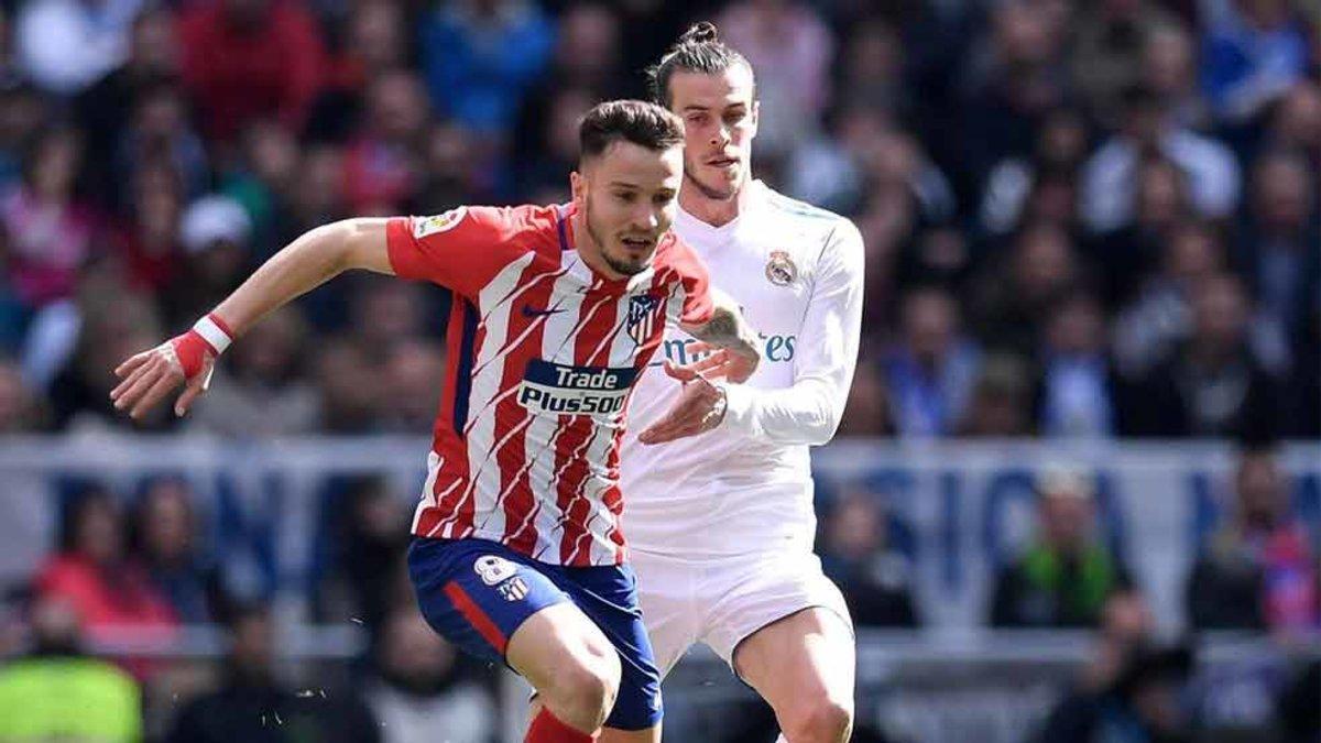 Saúl y Bale, durante un derbi madrileño