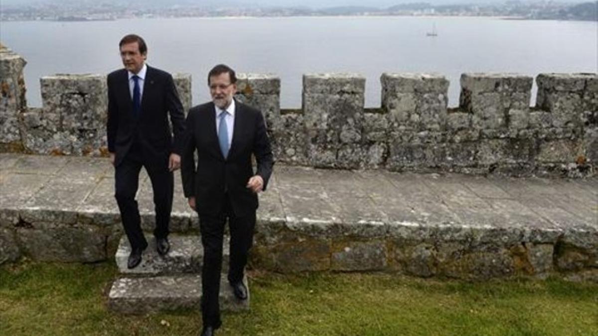 Bilateral 8Mariano Rajoy ayer, en Pontevedra, junto a su homólogo portugués Pedro Passos Coelho.