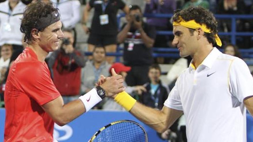 Nadal y Federer, durante un partido de esta temporada.