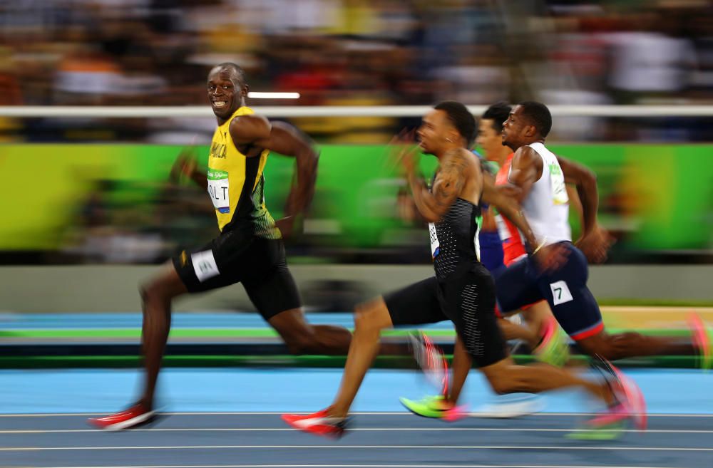 Tercer premio en la sección individual de Deportes. Usain Bolt sonríe a cámara en el transcurso de la semifinal de los 100 metros lisos de las Olpimpiadas de Río 2016. Fotografía de Kai Pfaffenbach.