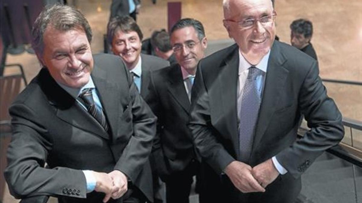 El presidente de CiU, Artur Mas, junto al líder de Unió, Duran Lleida, y, tras ellos, Tremosa y Sedó.