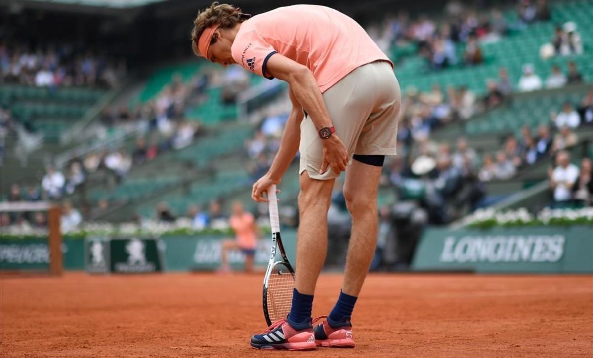 jpujol43621113 germany s alexander zverev reacts and touches his leg after 180605152833