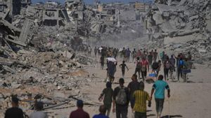 Milers de palestins tornen al nord de Gaza amb el primer replegament israelià