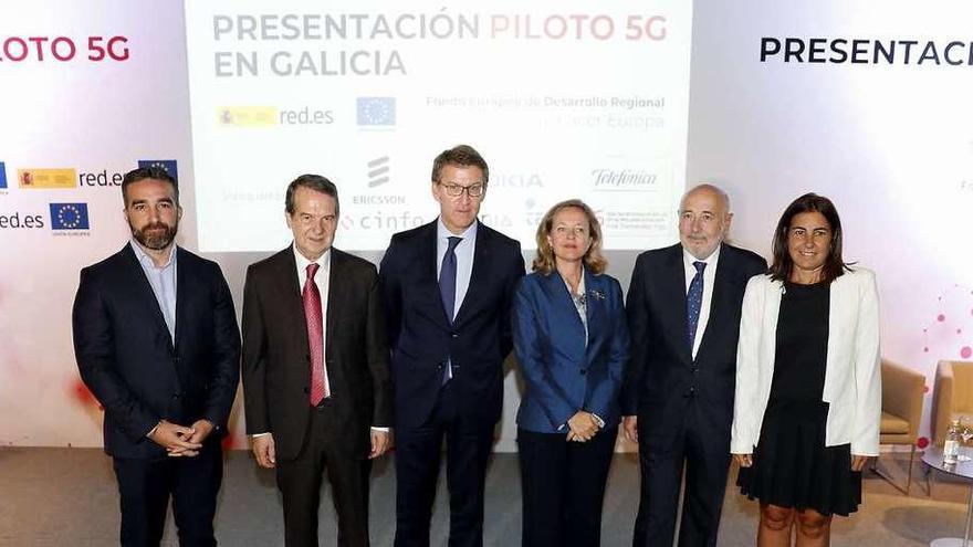 Francisco Polo, Abel Caballero, Alberto Núñez Feijóo, Nadia Calviño, Javier Losada y María Jesús Almazor, ayer, en Vigo. // J. Lores