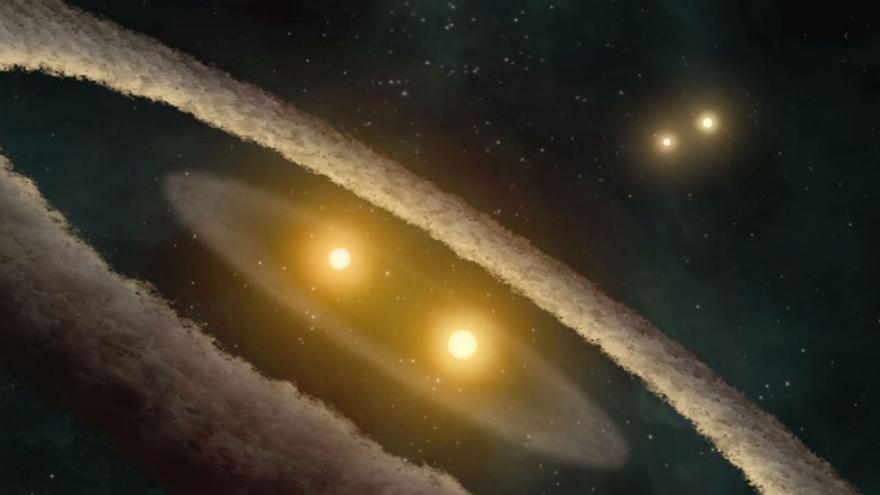 Interpretación artística de HD 98800, un sistema de estrellas cuádruples ubicado a 150 años luz de distancia de la Tierra en la constelación TW Hydrae. El sistema estelar terciario más masivo, TIC 470710327, podría haber comenzado con una configuración similar: dos sistemas binarios juntos, de los cuales uno de ellos finalmente se fusionó en una estrella más grande.