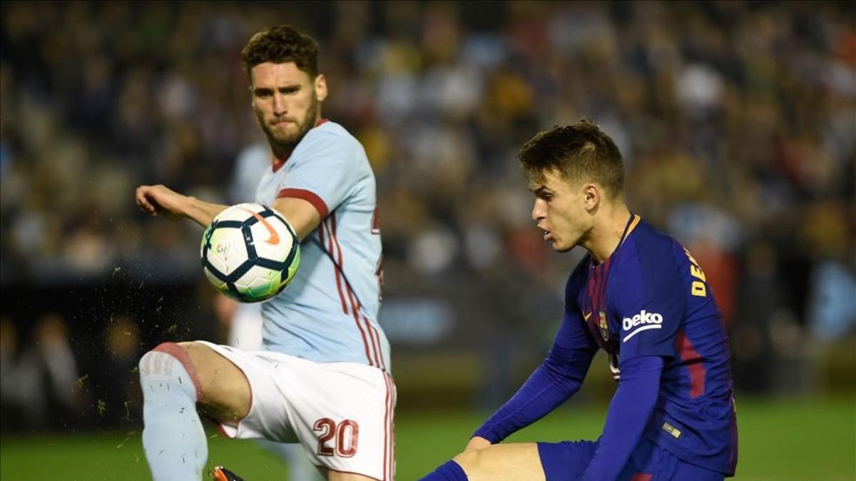 Denis Suárez saca la pelota ante Sergi Gómez