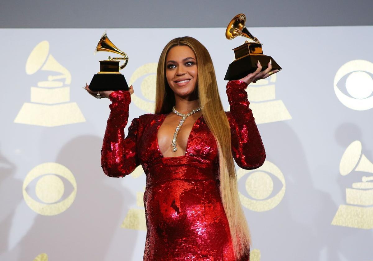 Beyonce holds the awards she won for Best Urban Contemporary Album for Lemonade and Best Music Video for Formation at the 59th Annual Grammy Awards in Los Angeles, California, U.S. , February 12, 2017. REUTERS/Mike Blake