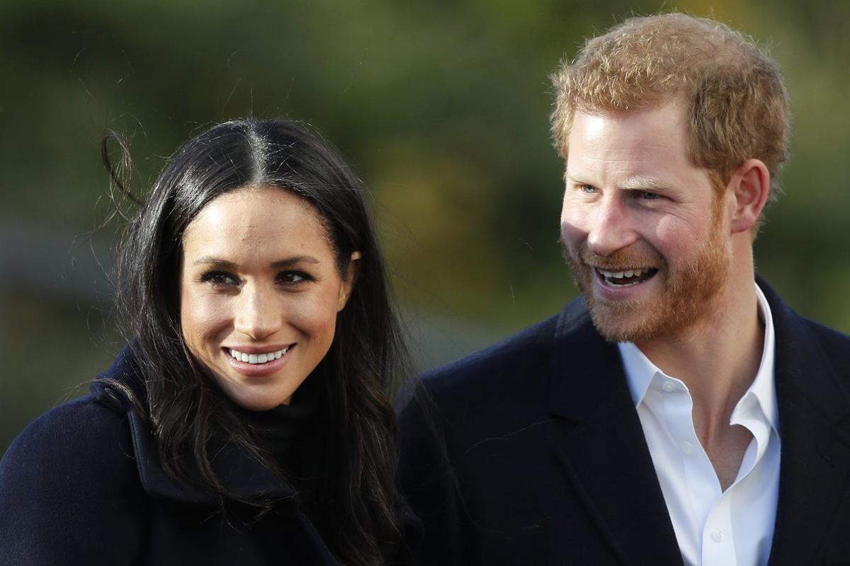 FILE - In this Dec. 1, 2017 file photo, Britain’s Prince Harry and his fiancee Meghan Markle arrive at Nottingham Academy in Nottingham, England. Buckingham Palace said Monday May 6, 2019, that Prince Harry’s wife Meghan has gone into labor with their first child. (AP Photo/Frank Augstein, File)