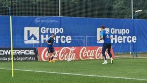 Cazorla y Paulino, en el entrenamiento de hoy