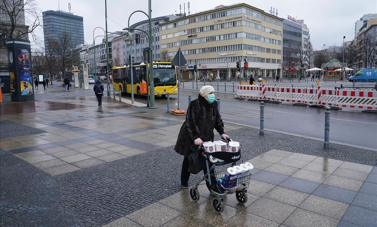 zentauroepp52973463 berlin  germany   march 30  an elderly woman wearing a prote200330201024