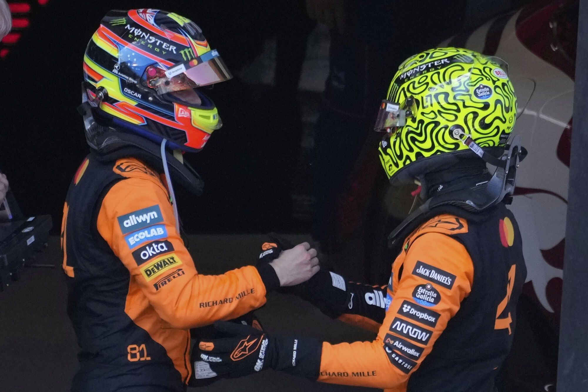 -Second-placed McLaren driver Oscar Piastri of Australia congratualtes the victory to McLaren driver Lando Norris of Britain during the Austrian Formula One Grand Prix in Spielberg, Austria, Sunday, June 29, 2025. (AP Photo/Darko Bandic)