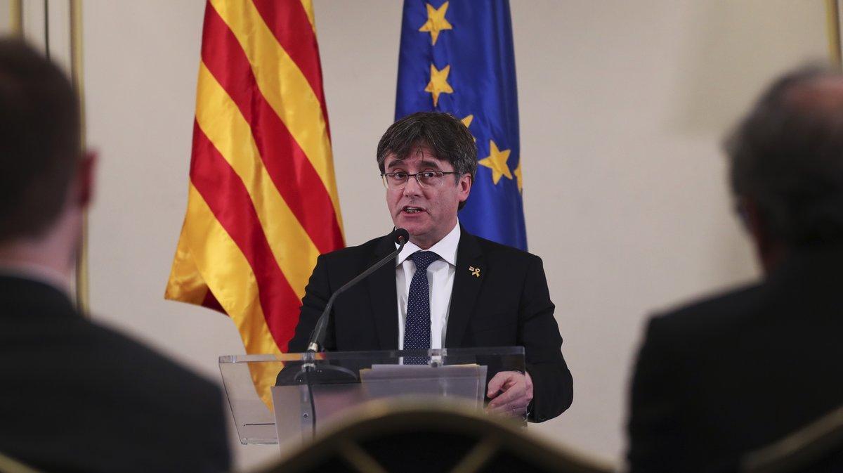 FILE - In this Feb. 18, 2019 file photo, Catalonia’s former regional president. Carles Puigdemont, addresses a conference in Brussels. A political group that wants Catalonia to break away from Spain and become an independent country said on Sunday, March 10, 2019, that Puigdemont is running for a seat in the European Parliament even though the Spanish government considers him a fugitive. (AP Photo/Francisco Seco, File)