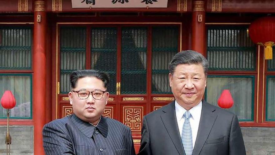 Kim Jong-un y Xi Jinping, esta semana, en Pekín. // AFP