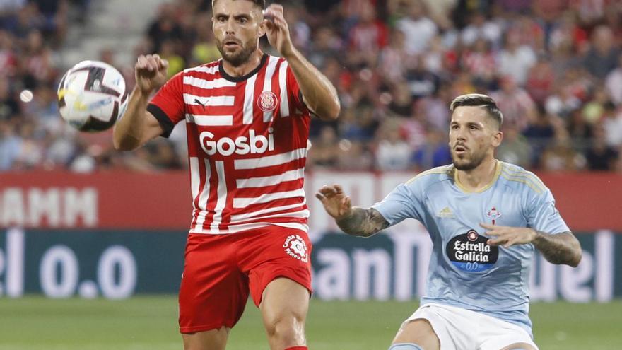 David López, en una acció del partit contra el Celta. | ANIOL RESCLOSA