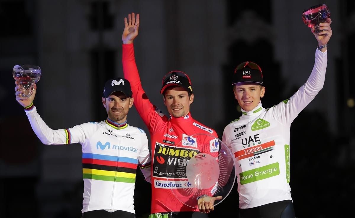 segea49879238 primoz roglic of slovenia centre celebrates on the podium 190915210010 segea49879238 primoz roglic of slovenia centre celebrates on the podium 190915210010