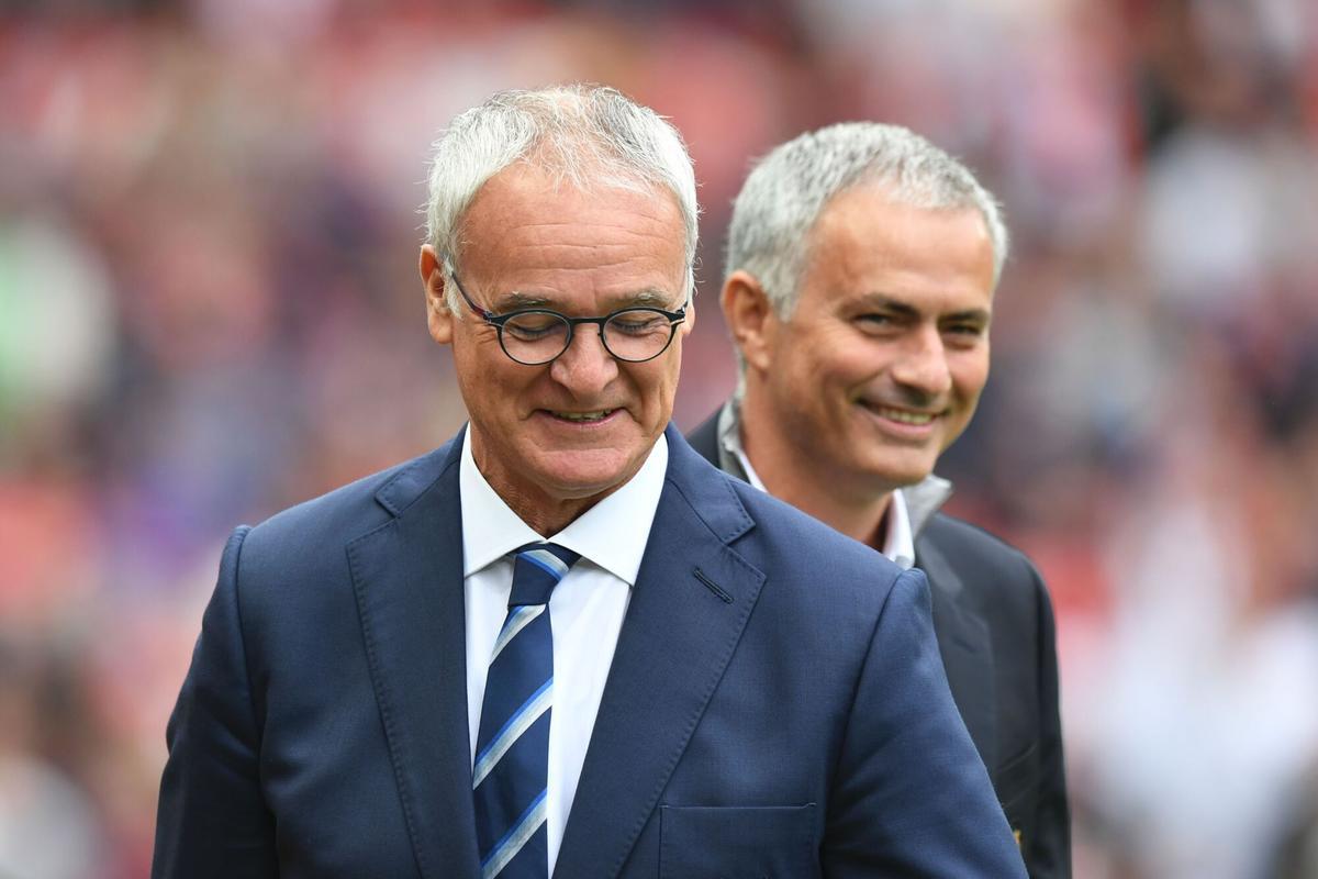 Leicester City's Italian manager Claudio Ranieri (L) and Manchester United's Portuguese manager Jose Mourinho (R) arrive on the pitch for the English Premier League football match between Manchester United and Leicester City at Old Trafford in Manchester, north west England, on September 24, 2016. / AFP PHOTO / ANTHONY DEVLIN / RESTRICTED TO EDITORIAL USE. No use with unauthorized audio, video, data, fixture lists, club/league logos or 'live' services. Online in-match use limited to 75 images, no video emulation. No use in betting, games or single club/league/player publications. /. HORIZONTAL