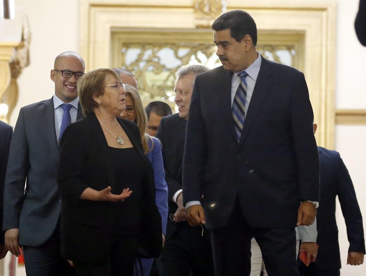U N  High Commissioner for Human Rights Michelle Bachelet  left  chats with Venezuela s President Nicolas Maduro  as they walk out of a meeting at Miraflores Presidential Palace  in Caracas  Venezuela  Friday  June 21  2019  The United Nations  top human rights official is visiting Venezuela amid heightened international pressure on President Maduro   AP Photo Ariana Cubillos