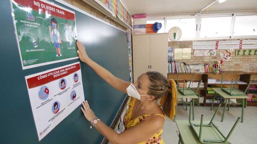 Colocación de normas covid el curso pasado en un colegio cordobés.