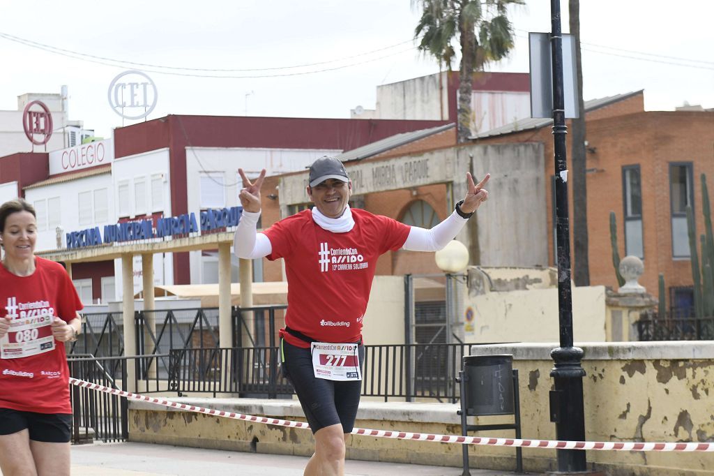 La XIII carrera solidaria Corriendo con Assido, en imágenes