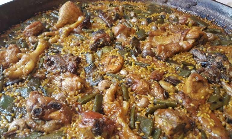 La paella valenciana con arroz bomba que cocinará el Restaurante Rioja.