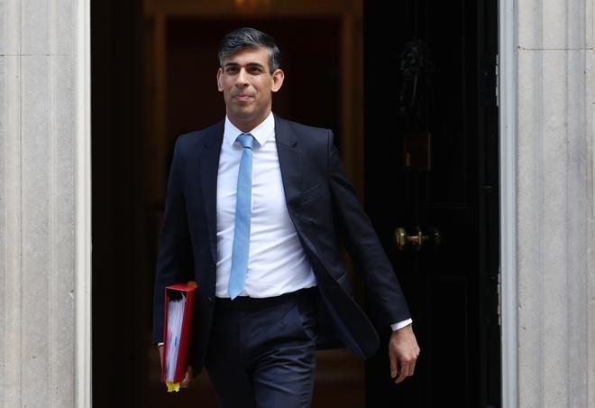 British Prime Minister Rishi Sunak departs for PM Questions at the parliament in London