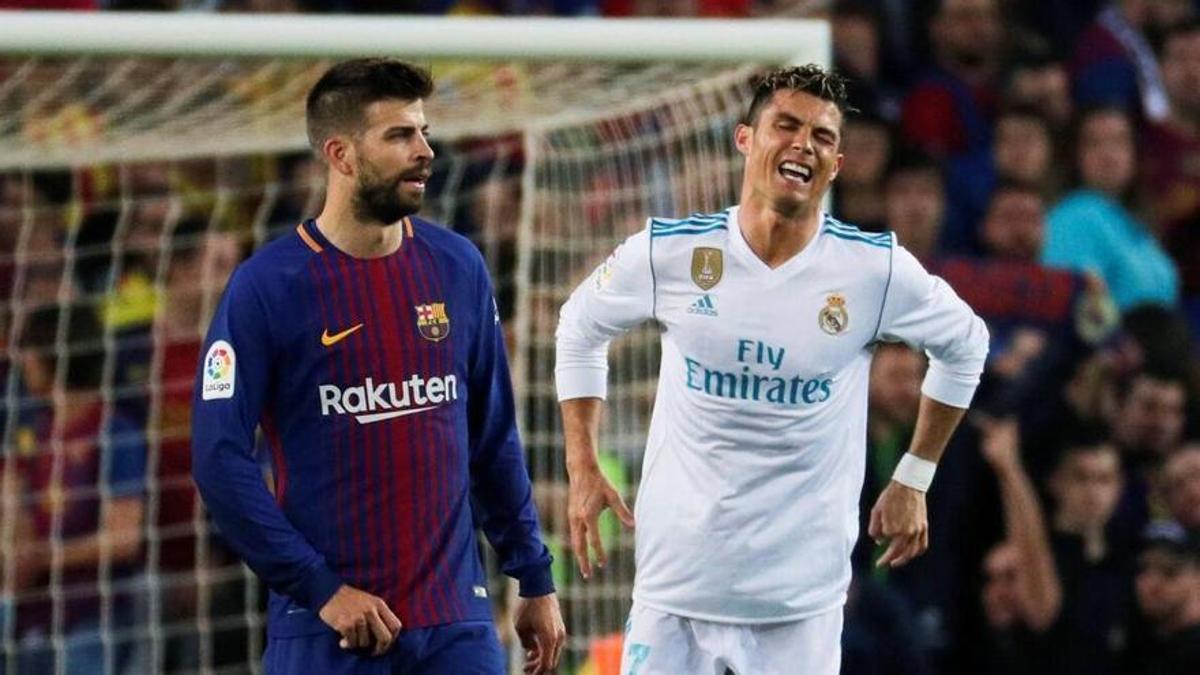 Gerard Piqué y Cristiano Ronaldo.