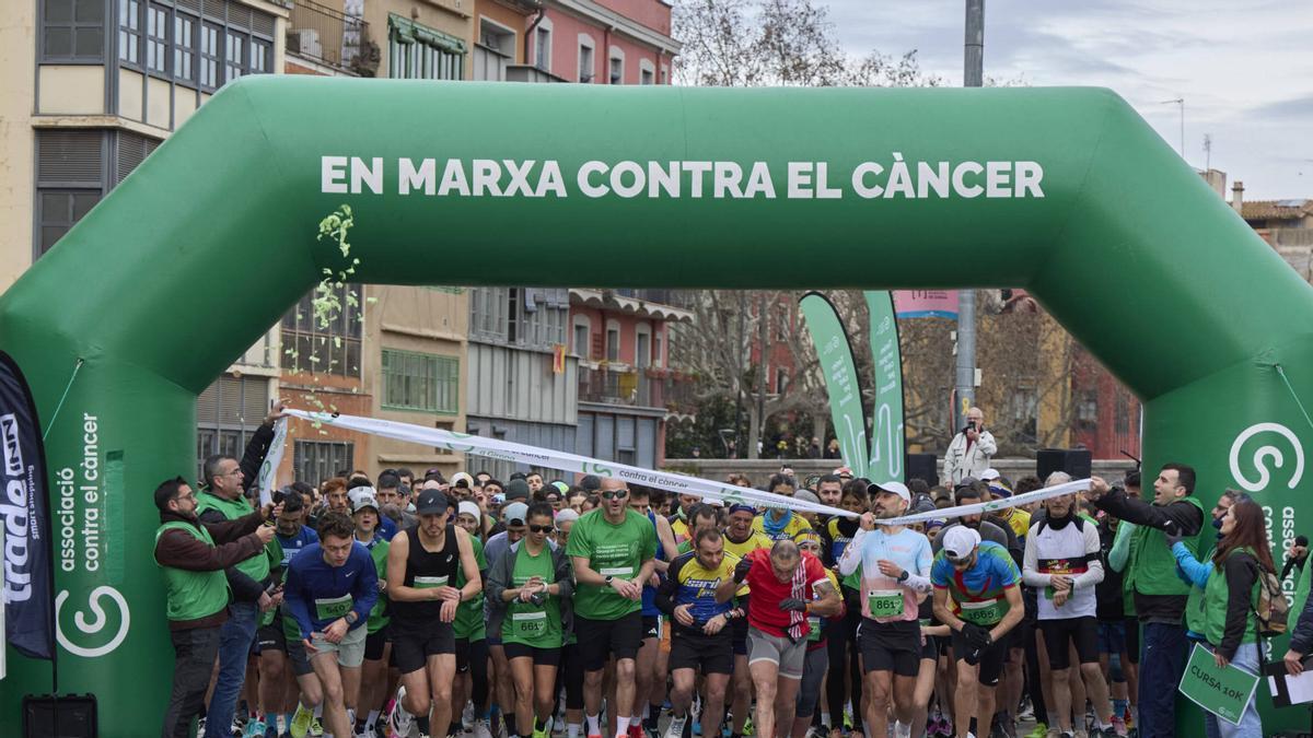 La XII Tradeinn Cursa Girona en Marxa Contra el Càncer en imatges