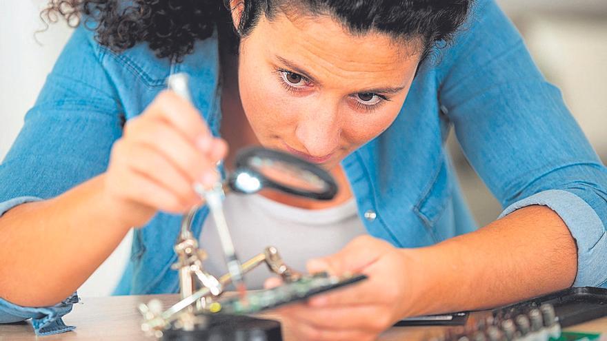 engineer woman repairs laptop support fixing notebook computer