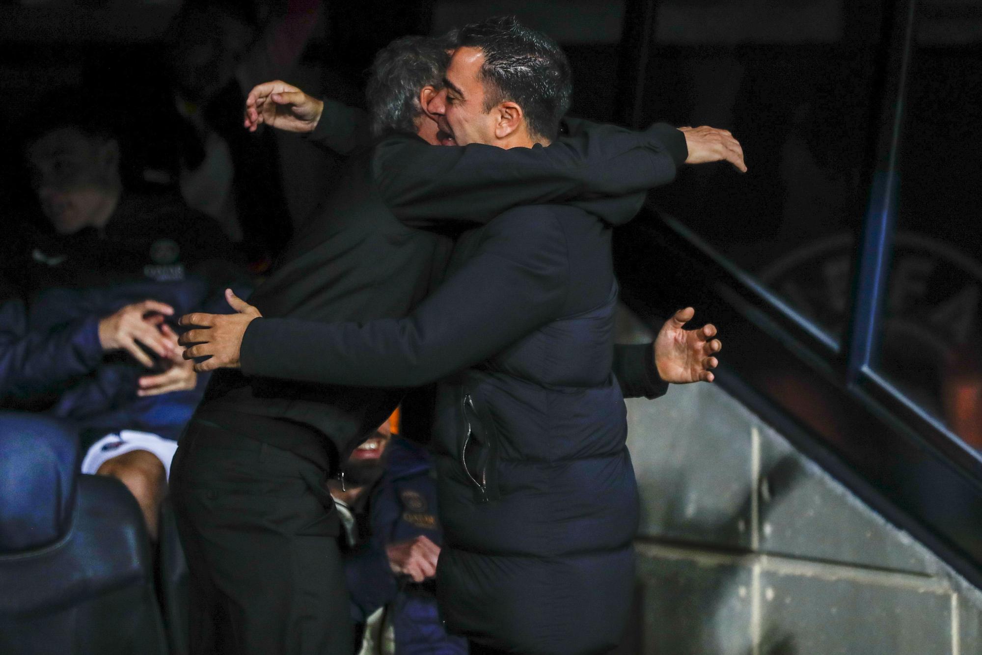 FC Barcelona's head coach Xavi Hernandez (R) greets PSG's head coach Luis Enrique (L) ahead of the UEFA Champions League quarter finals second leg soccer match between FC Barcelona and Paris Saint-Germain, in Barcelona, Spain, 16 April 2024. EFE/ Alberto Estevez