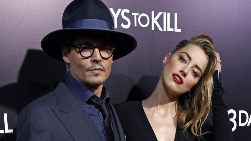 Johnny Depp, junto a Amber Heard.