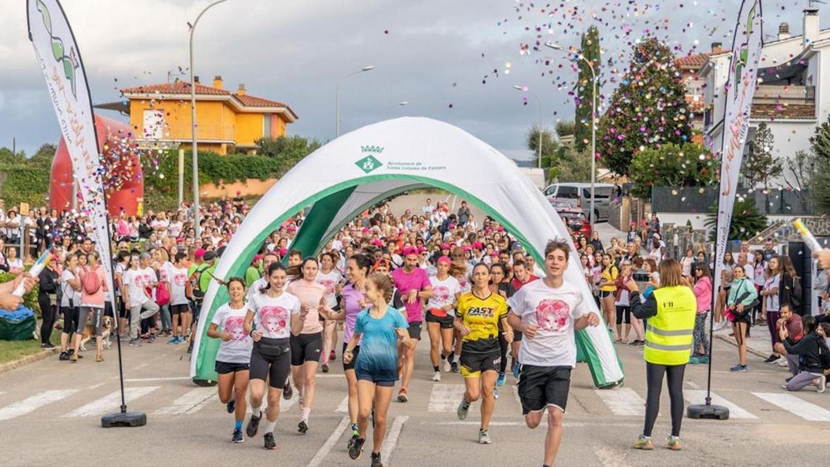 La cursa solidària pel càncer de mama celebrada a Santa Coloma de Farners