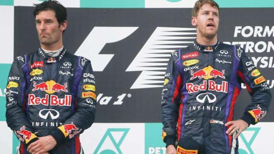 Webber y Vettel se ignoran mutuamente en el podio. // Diego Azubel