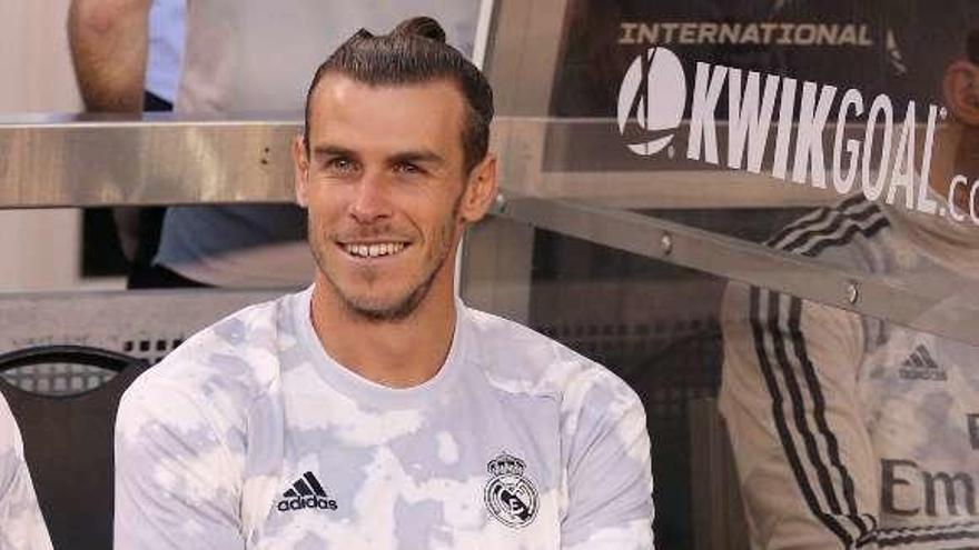 Bale sonríe antes de un partido de pretemporada. // Efe
