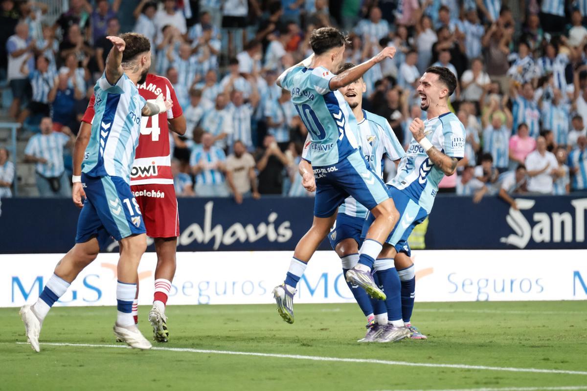 Dani Sánchez, Larrubia, Chupe y Joaquín celebran el 2-0 ante el Granada