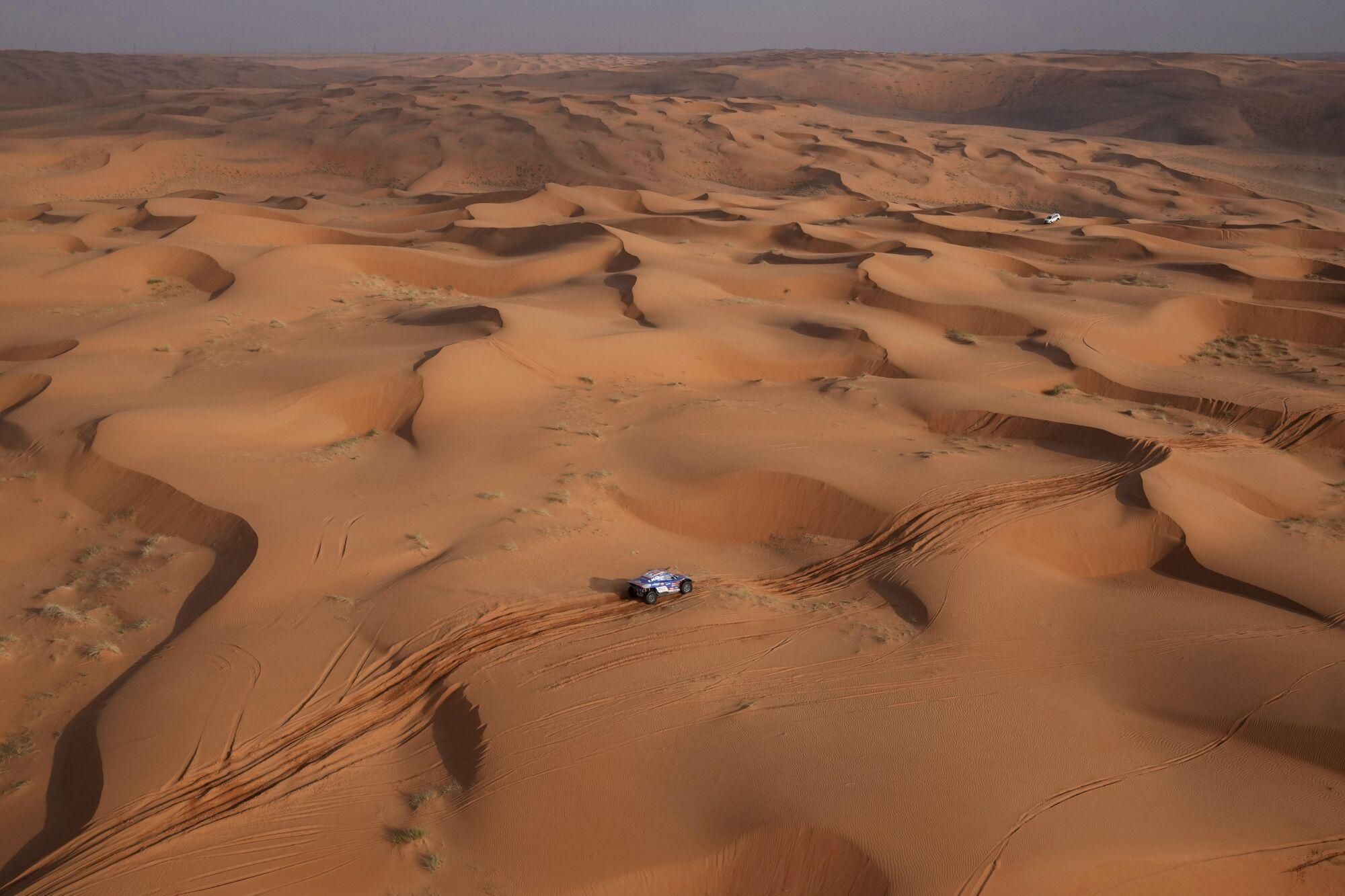 Driver Toby Price and co-driver Sam Sunderland compete during the sixth stage of the Dakar Rally between Hail and Al Duwadimi, Saudi Arabia, Saturday, Jan. 11, 2025. (AP Photo/Christophe Ena) Associated Press/LaPresse. EDITORIAL USE ONLY/ONLY ITALY AND SPAIN