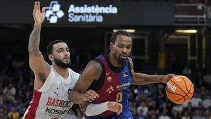 El azulgrana Punter intenta zafarse de la defensa de Howard, este domingo en el duelo disputado en el Palau.