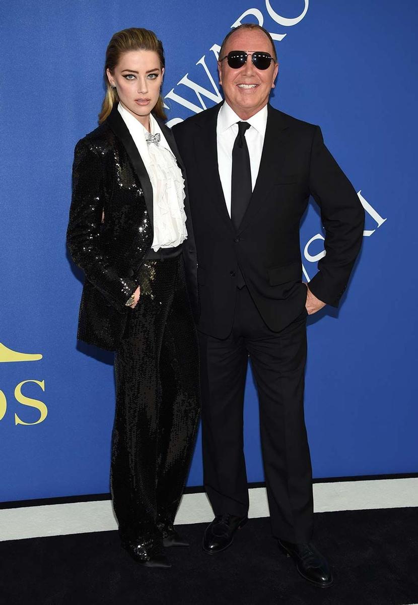 Amber Heard y Michel Kors, en los CFDA Awards 2018