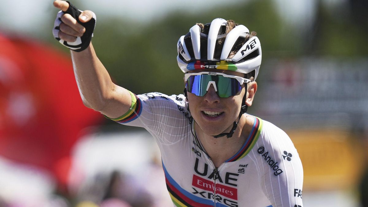 Slovenia's Tadej Pogacar celebrates as he crosses the finish line to win the seventh stage of the Tour de France cycling race over 197 kilometers (122.4 miles) with start in Saint-Malo and finish in Mur-de-Bretagne Guerledan, France, Friday, July 11, 2025. (AP Photo/Thibault Camus). EDITORIAL USE ONLY/ONLY ITALY AND SPAIN