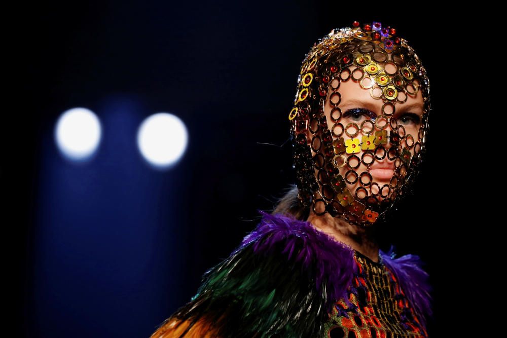A model presents a creation by designer Jean ...